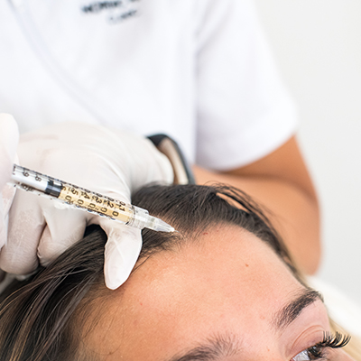 prp-behandling pågår på en kvinna